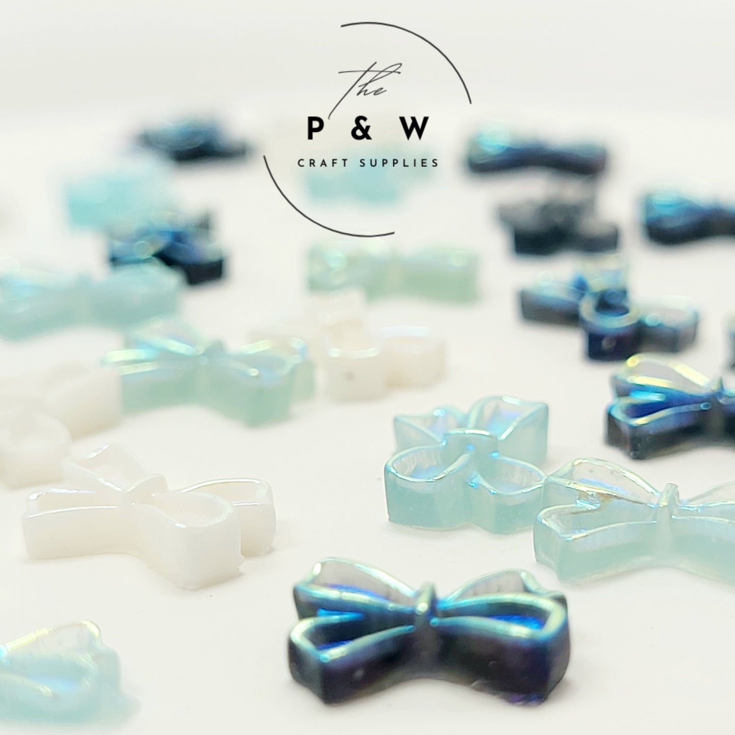 N 59 - Iridescent Bow Nail Charms D