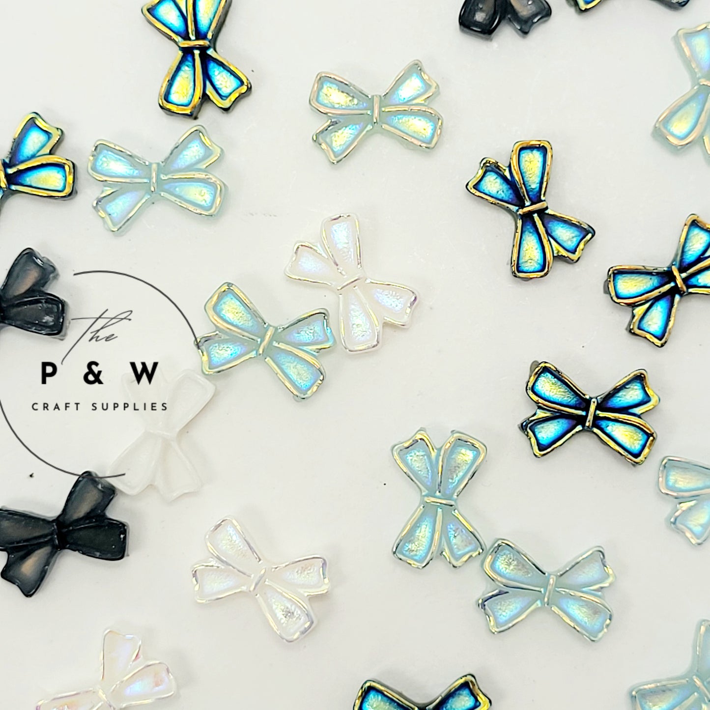 N 59 - Iridescent Bow Nail Charms D
