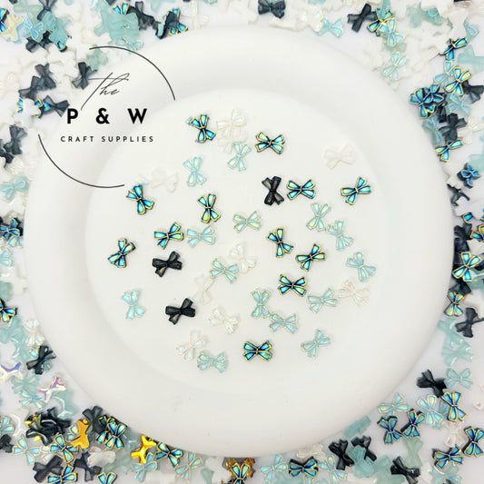 N 59 - Iridescent Bow Nail Charms D