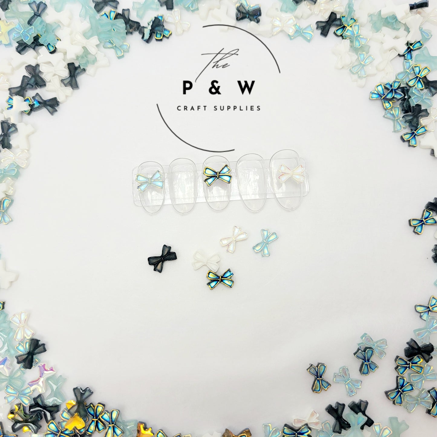 N 59 - Iridescent Bow Nail Charms D