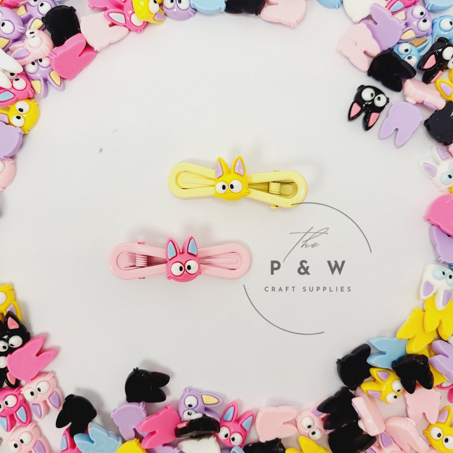 N 219 - Googly-Eyed Cat Face Charms